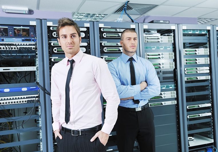 it outsourcing engineers two it engineers in server room